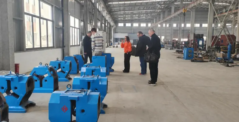 Russian customer delegation reviewing copper rod rolling equipment at HG Smart Equipment in Deyang